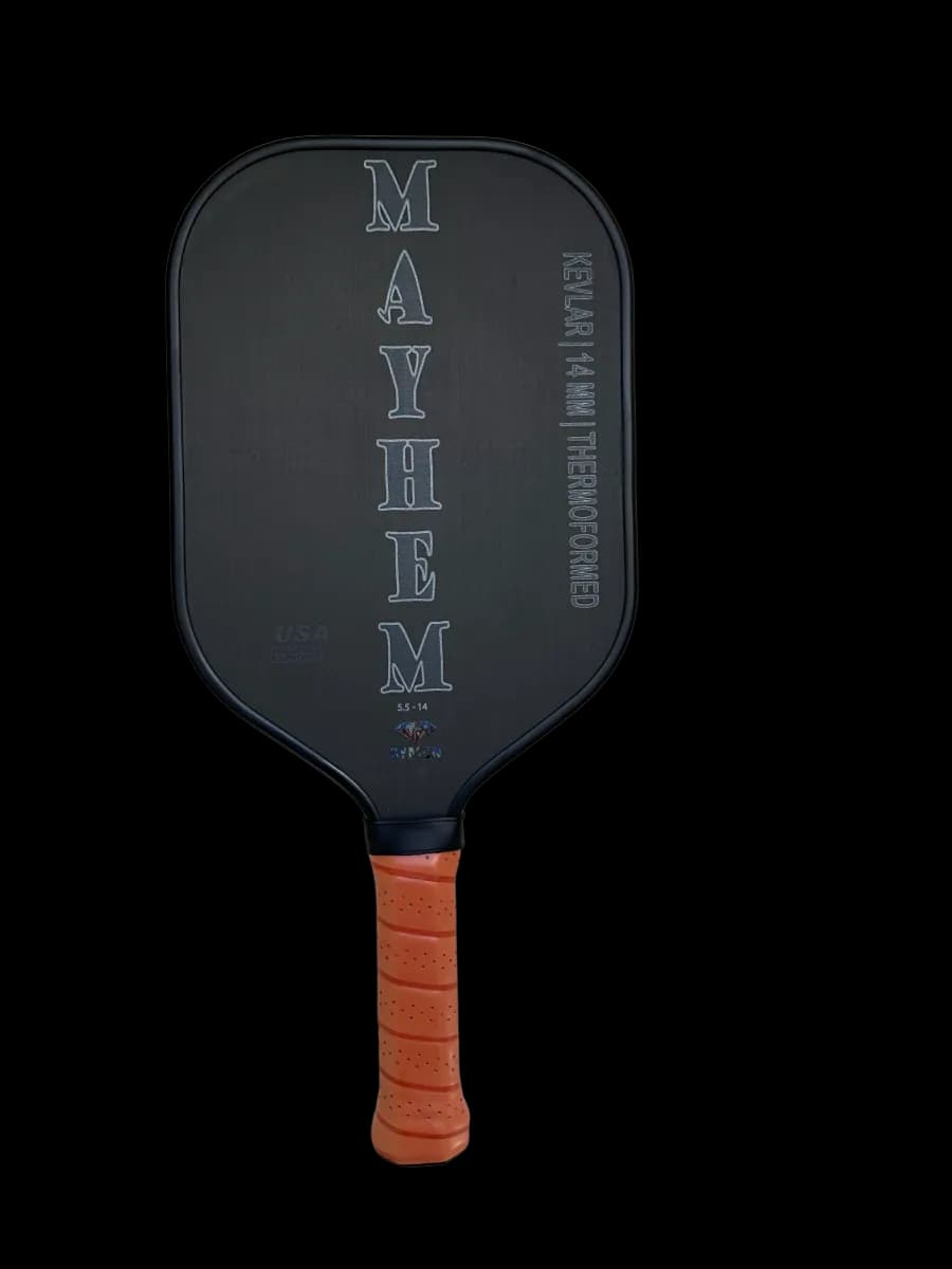 Dymon Mayhem pickleball paddle, black carbon face with an orange grip